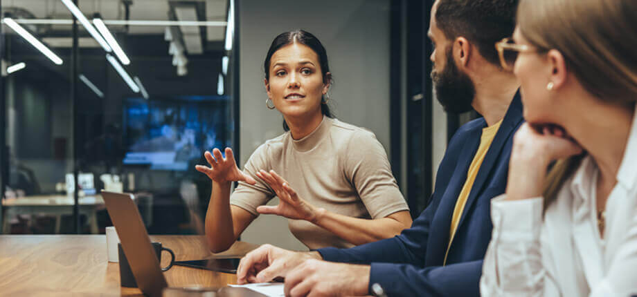 Young businesswoman leading a discussion during a meeting