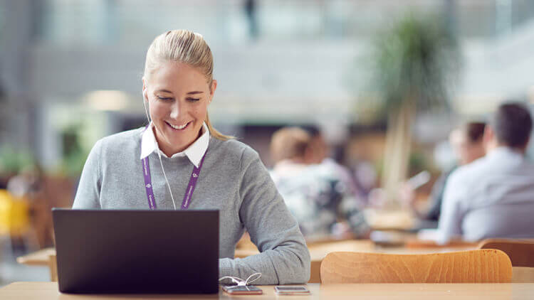  Experian female employee working in the canteen 